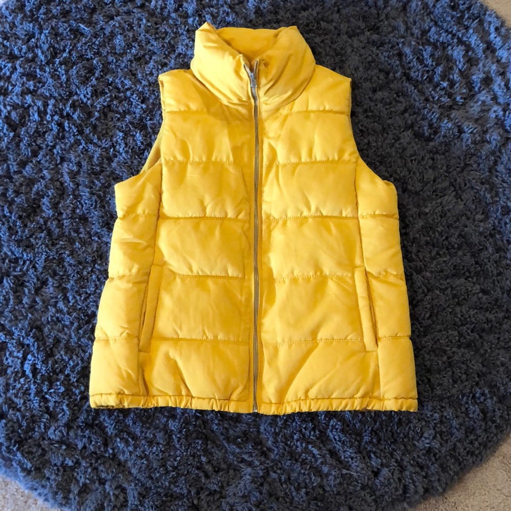 Yellow puffy vest. NEVER WORN!!